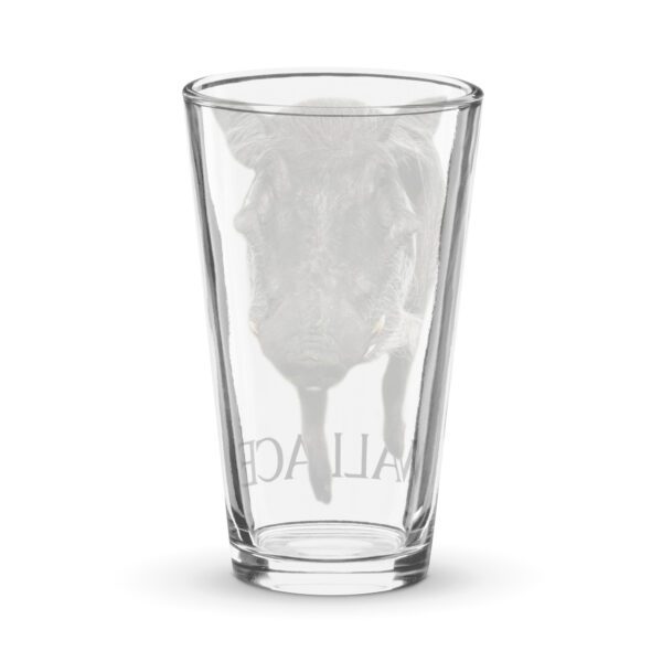 A glass with a picture of a cow on it.