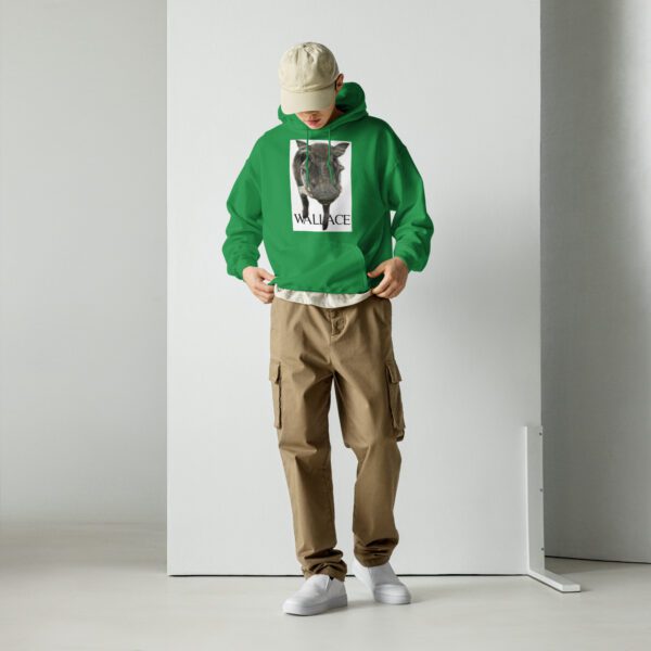 A man in green hoodie and brown pants.