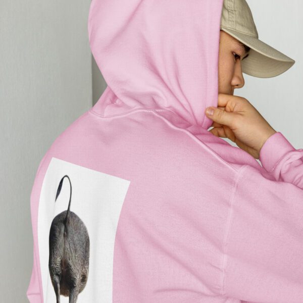 A person wearing a pink hoodie with an image of a mouse on it.