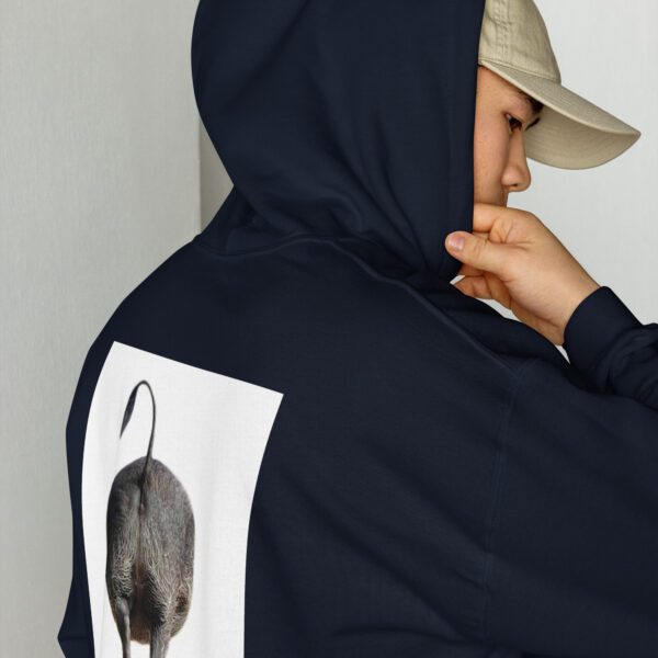 A person wearing a hat and jacket with an image of a mouse on it.
