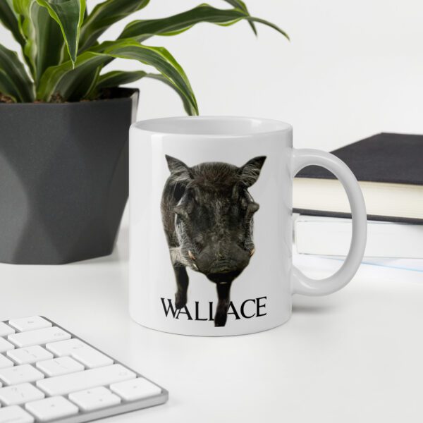 A coffee mug with the name wallace on it.