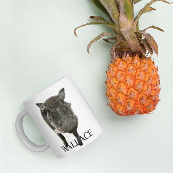 A mug that has an animal on it.