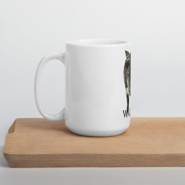 A coffee mug with an image of a bird on it.
