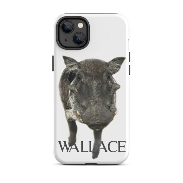 A cow with the name wallace on it's face.