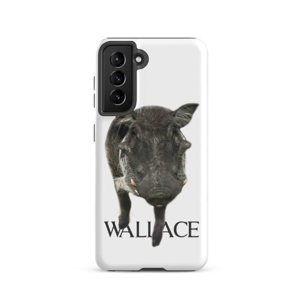 A cow with name wallace on it's back